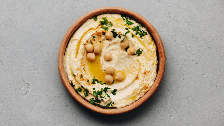 hummus and chickpeas in bowl