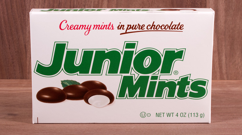 Box of Junior Mints against wooden background