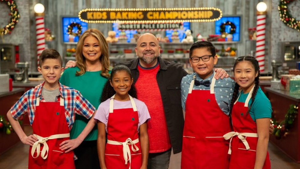 Kids Baking Championship judges with contestants