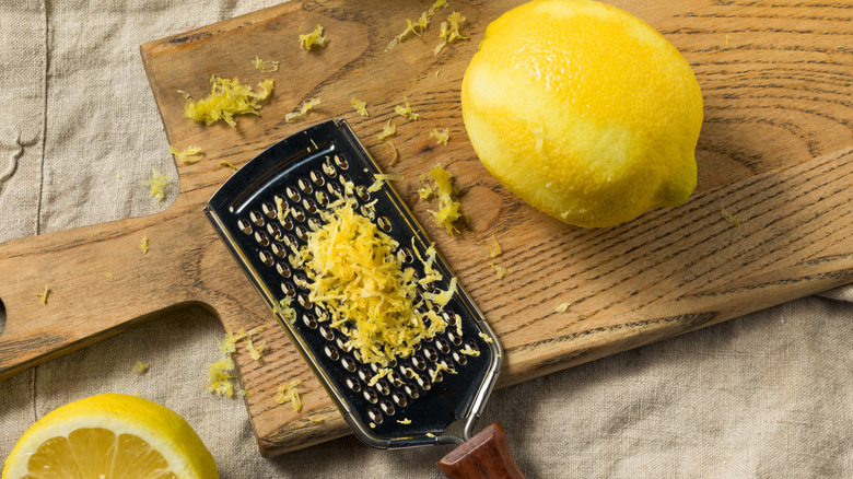 Lemon, lemon zest on grater