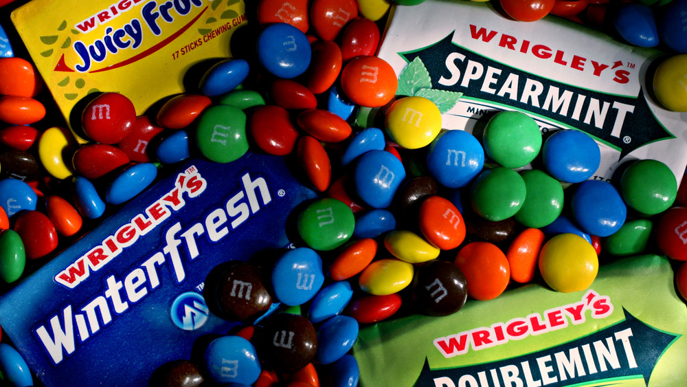 Colorful candies with packs of chewing gum