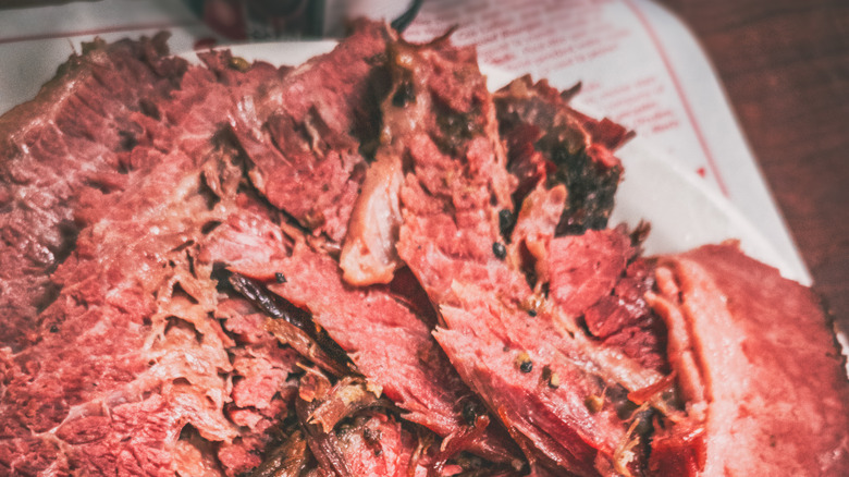 Plate of sliced smoked meat