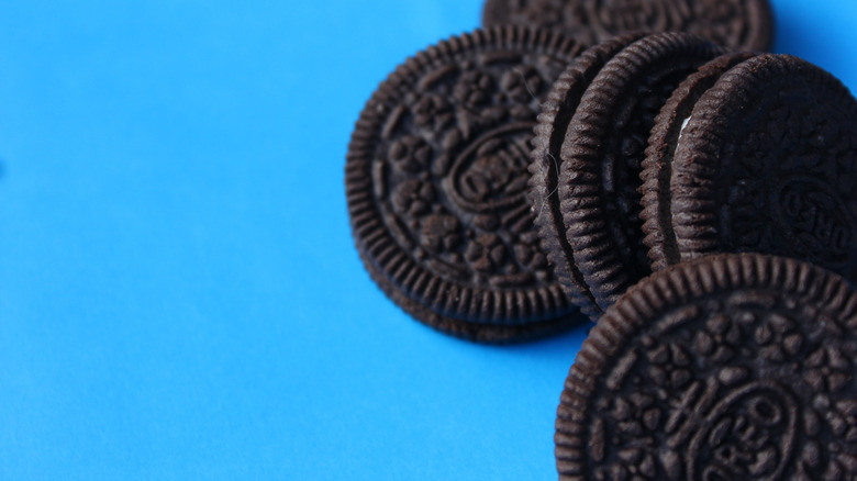 Oreo cookies and blue background