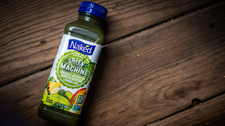 Naked Juice on a wood background