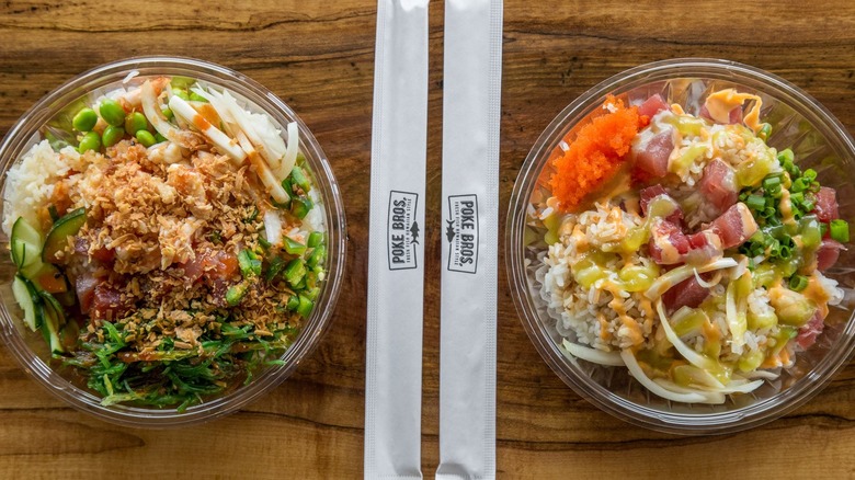 Poke Bros. bowls with branded chopsticks