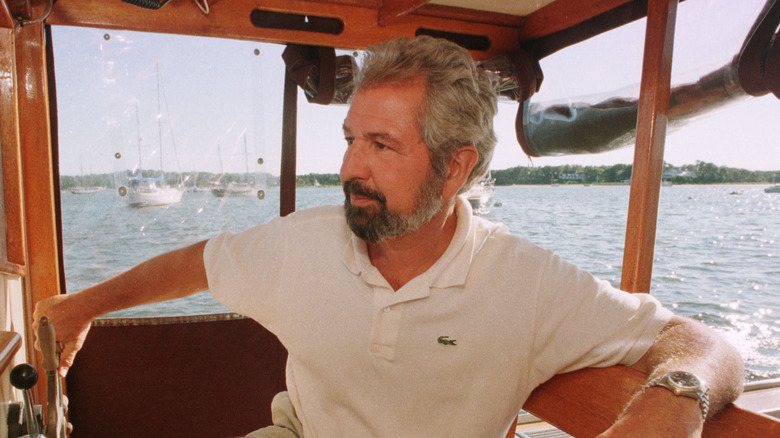 Bob Vila driving a boat.