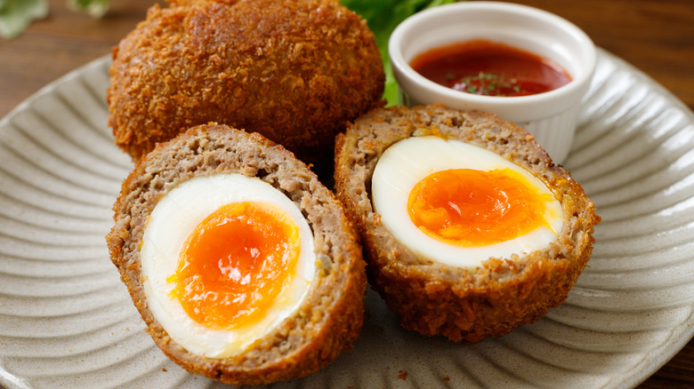 Scotch eggs on a plate