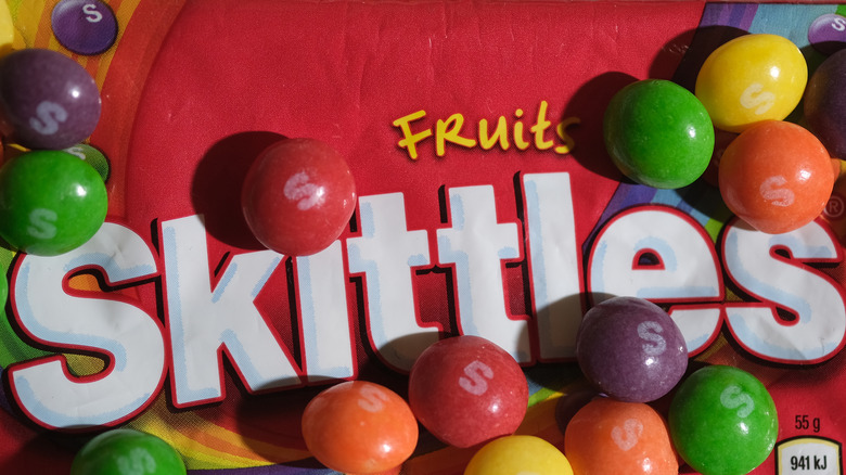 Closeup bag of Skittles and packaging