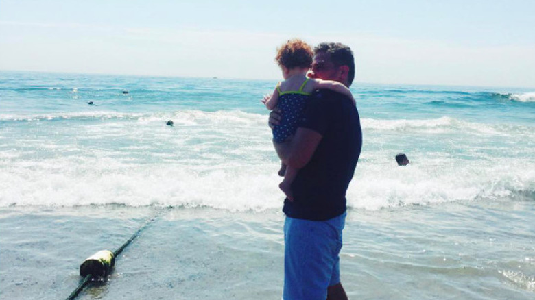 Perelman's husband and one of her children