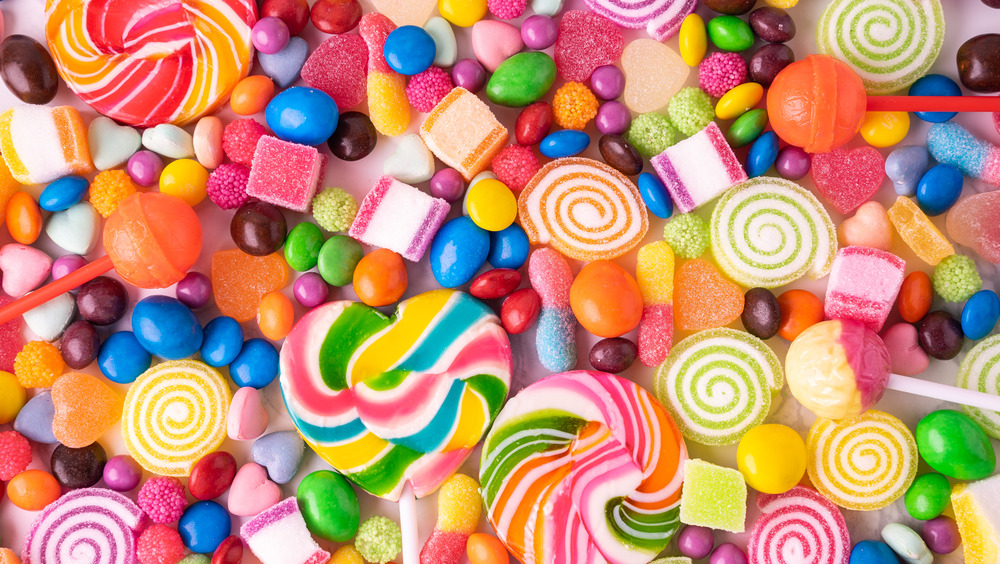 Colorful pieces of candy on a flat surface
