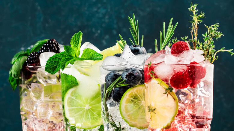 four fruity cocktails with herbs