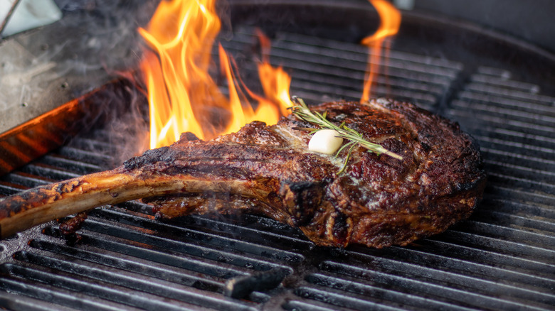 Tomahawk steak on grill