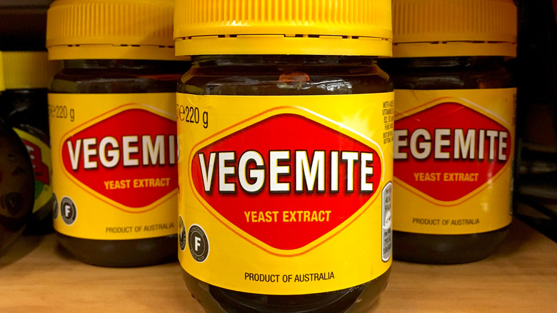 three jars of vegemite on shelf