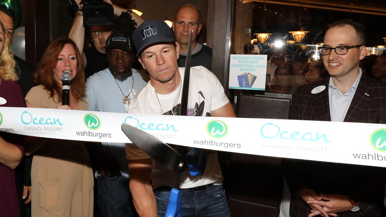 mark wahlberg walhburgers ribbon cutting