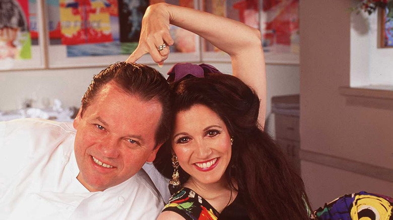 Barbara Lazaroff and Wolfgang Puck at restaurant