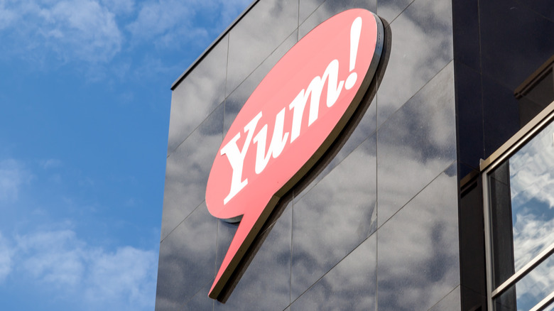 Yum brands sign on the side of a building