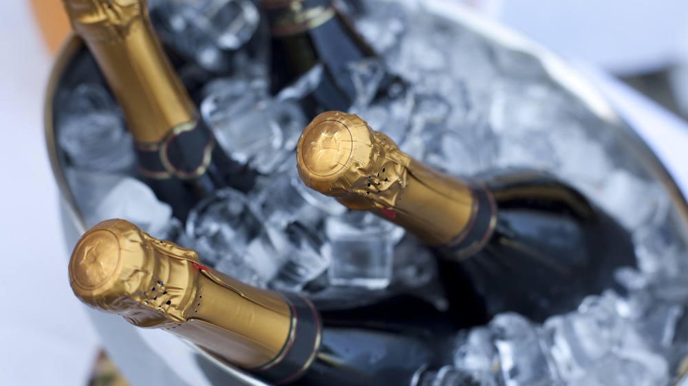 Champagne bottles in an ice bucket
