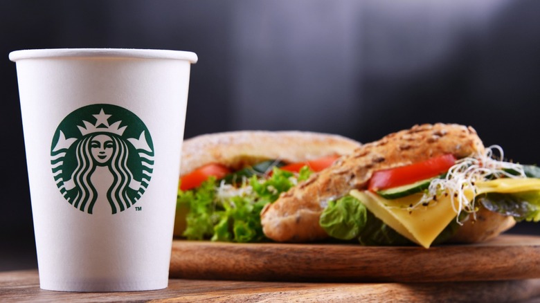 Starbucks cup with sandwich