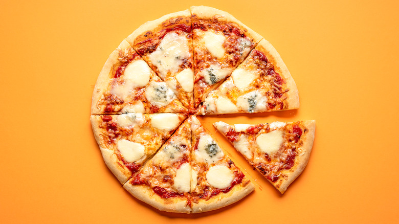 round pizza with separate pizza slice