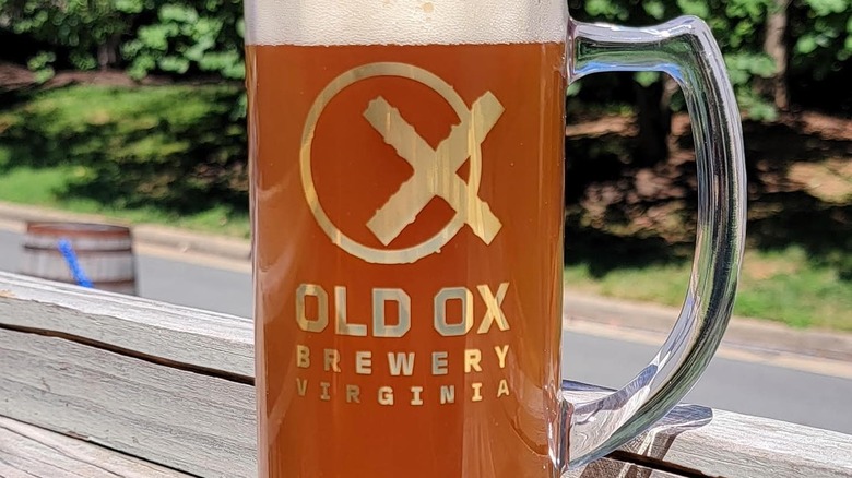 Old Ox logo on glass stein