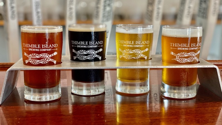 flight of four Thimble Island tasting glasses