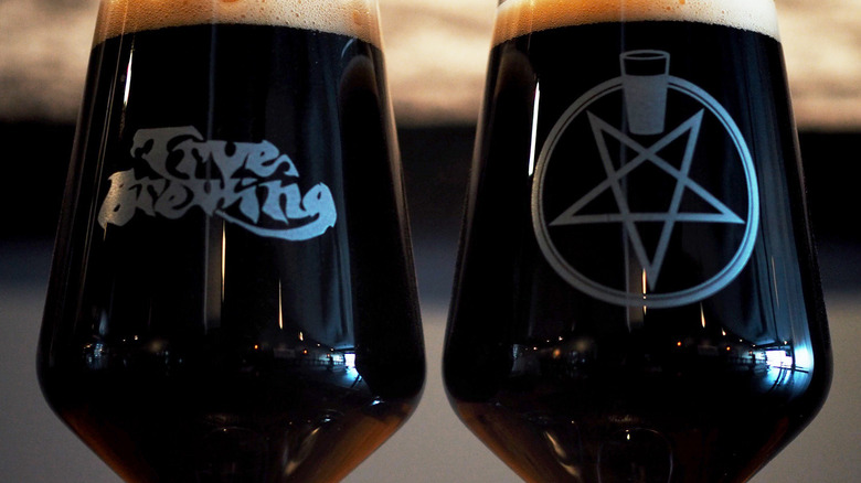 tulip glass with Trve Brewing logo beside tulip glass with pentagram logo