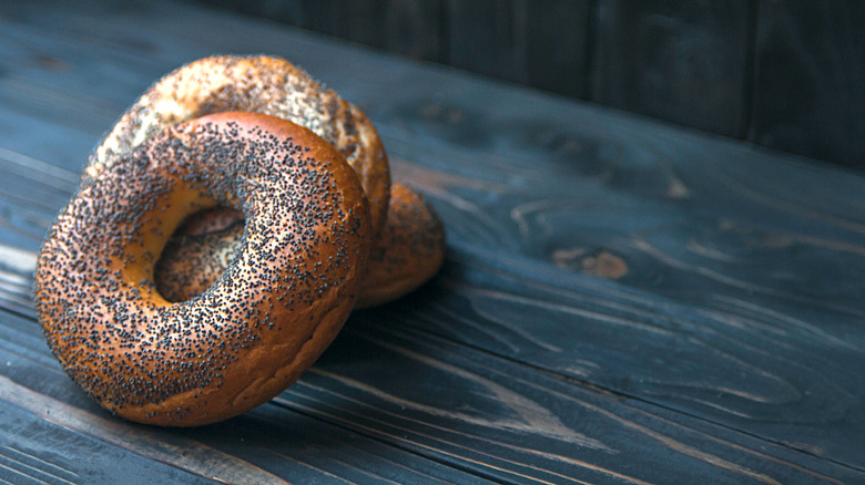 poppy seed bagel on table