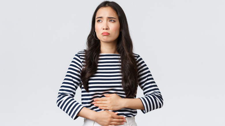 Woman with upset stomach