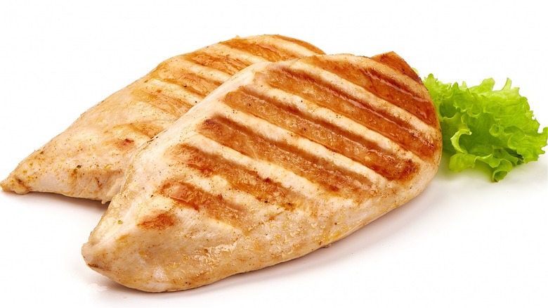 Two grilled chicken breasts 