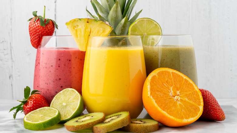 Three fruit smoothies in glasses