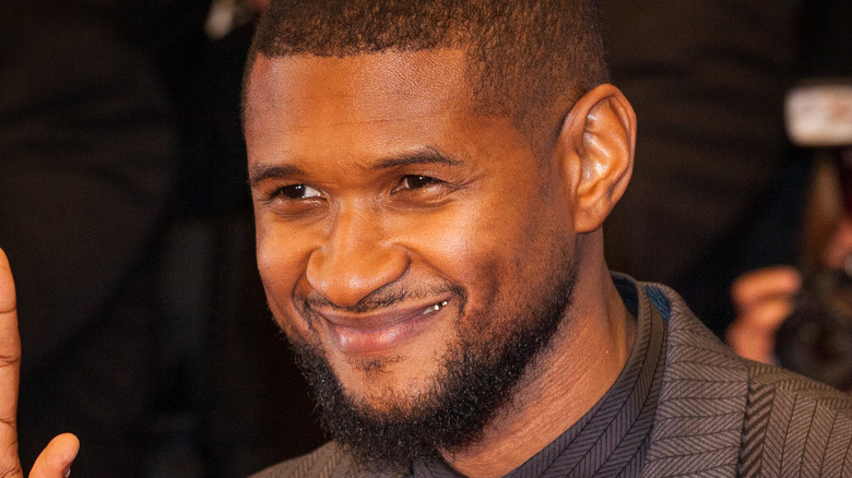 Usher smiling