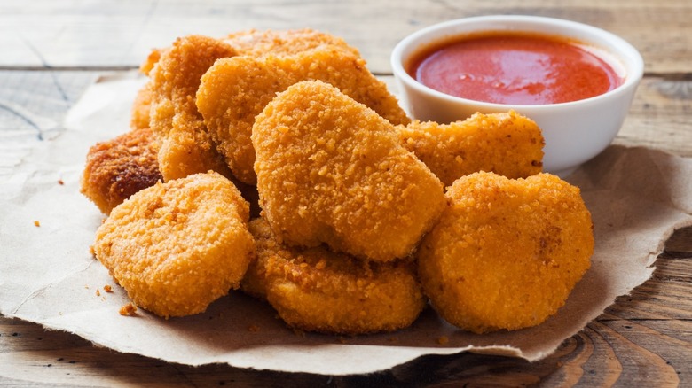 Vegan golden nuggets and red sauce 