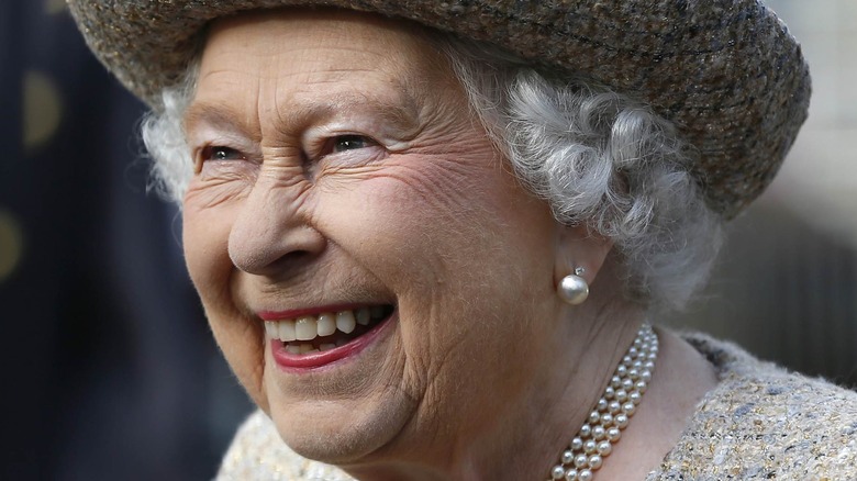 Queen Elizabeth II laughing at an event