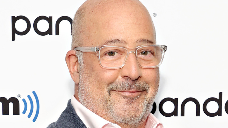 Andrew Zimmern smiling 