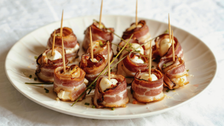 Bacon wrapped appetizers on toothpicks