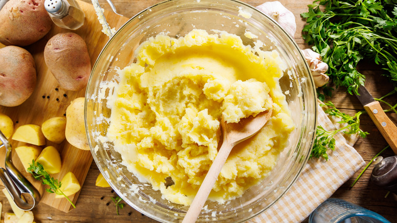 Mashed potatoes in bowl with spoon