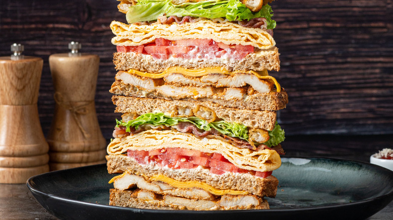Stacked club sandwich on plate