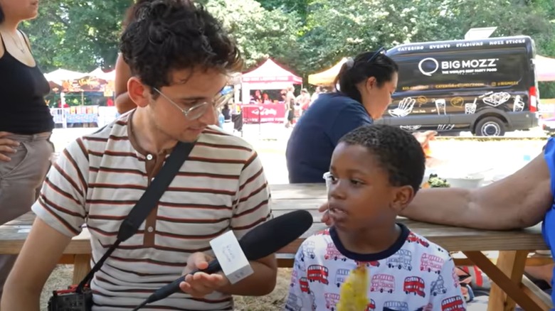 Corn kid Tariq being interviewed about corn