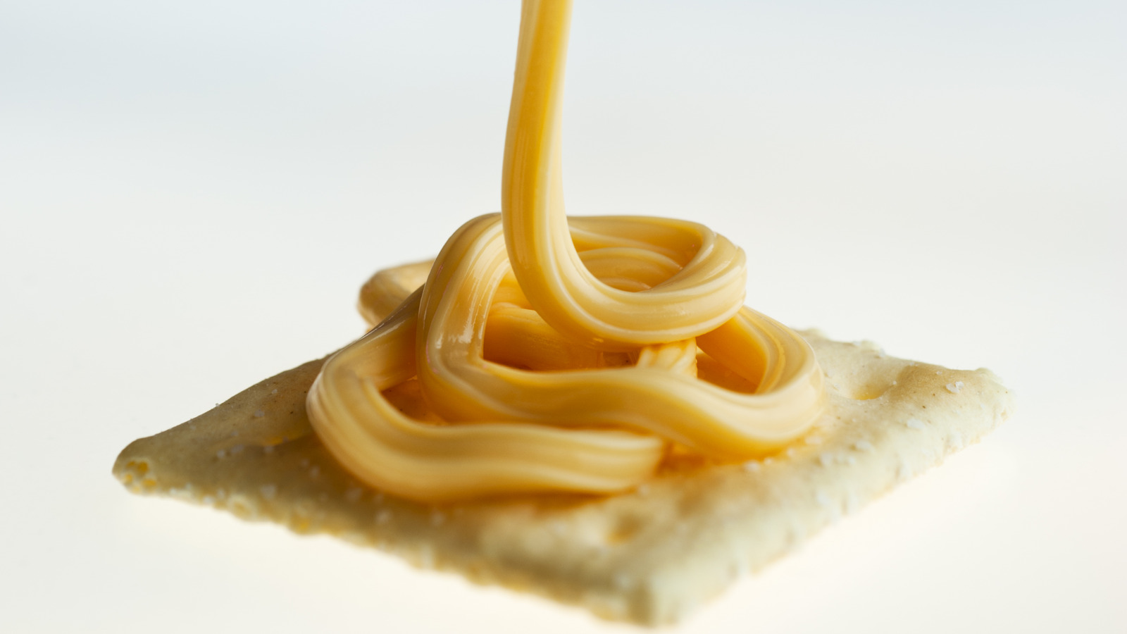 The Viral Hack That Makes Eating Cheez Wiz And Crackers A Breeze