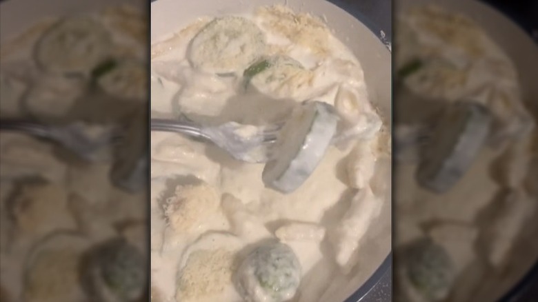 Close up of cucumber & pasta drenched in mayo 