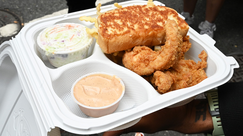 Takeout plate of fried chicken and toast 