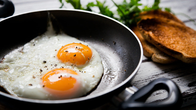 Eggs cooking in a non-stick pan
