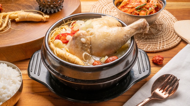Chicken boiling in pot