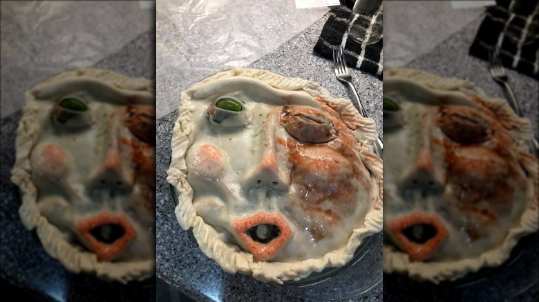 Pie crust in shape of deformed face