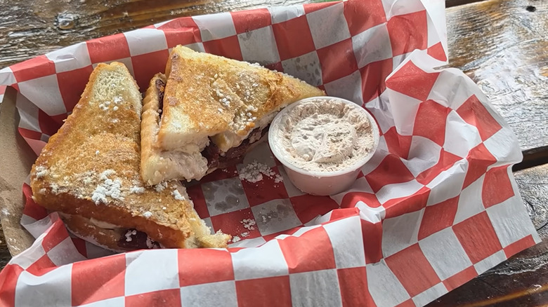 The Berry Good Grilled Cheese in a takeout container