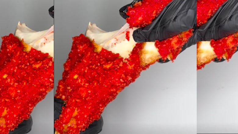 Cheese pull on a Flamin' Hot Giant Mozz