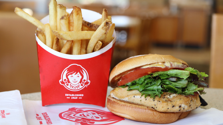 Close up of a Wendy's chicken sandwich and fries