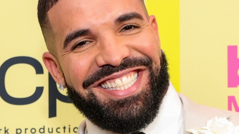 Drake smiling