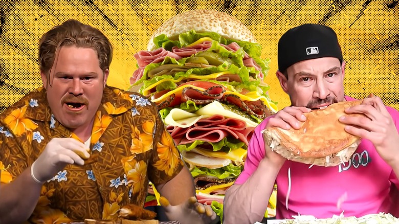 competitive eaters with large burgers