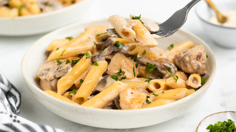 Pasta with mushrooms in bowl